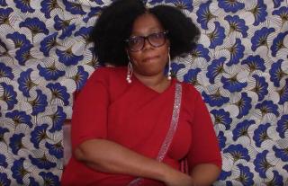 A woman talking about Pre-Colonial Succession Disputes and Civil Wars in Benin Kingdom